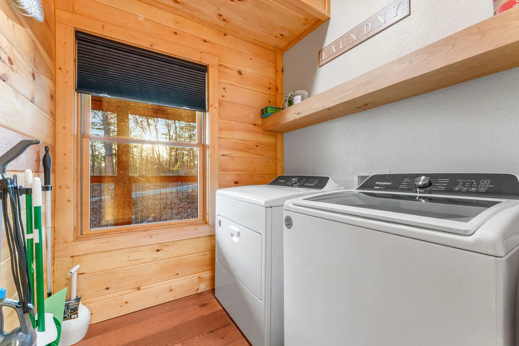 In-cabin laundry area with a full-size washer and dryer